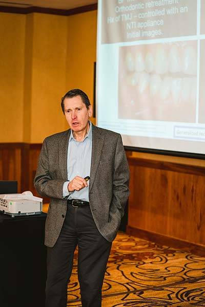 Dr. Colin Richman giving seminar about his course.